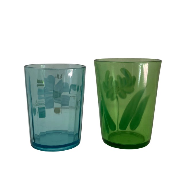 Offering two Victorian glass tumblers from my own collection. They are both handpainted with lovely floral designs. The...