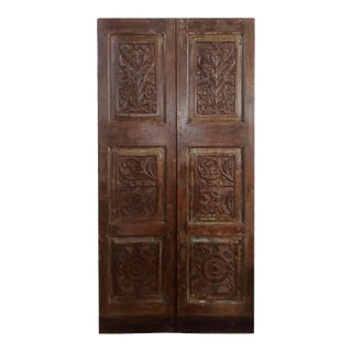 Pair of Rustic Carved Sliding Floral Carved Barn Doors For Sale