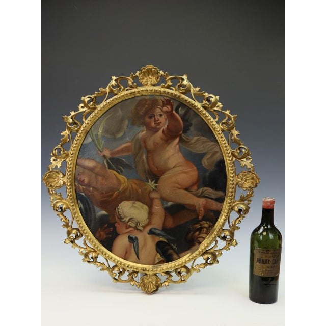 An Italian Oil Painting on Canvas in a Giltwood Florentine Frame 18th Century This finely painted Italian oil on canvas,...
