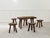 A beautiful Brutalist living room set comprising a coffee table and five stools, crafted in the 1960s from blackened pine....