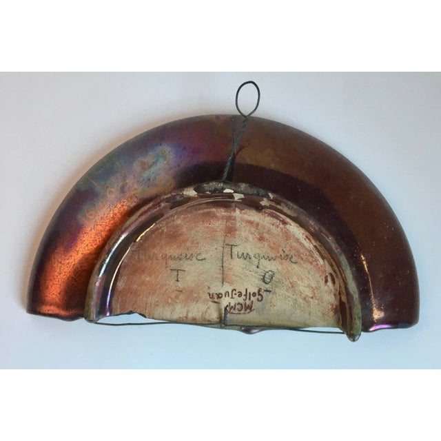 In the French Art Nouveau style, Pierre Clement Massier is known for his innovative use of metallic luster glazes, subtle...