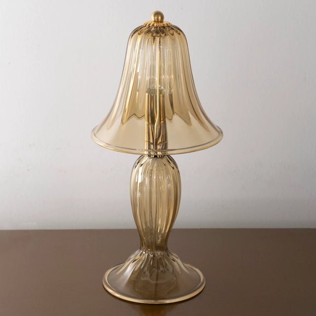 Murano glass table lamp in smoky color and gold details, handmade made in italy venetian design lighting. also available...