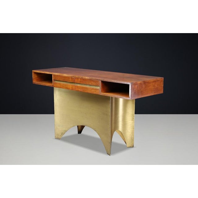 Exceptional Italian Walnut Console with Patinated Brass Base, 1950s An exceptional Italian walnut freestanding...
