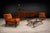 A sculptural and highly refined pair of armchairs by Giuseppe Scapinelli, executed in richly grained Brazilian caviúna...