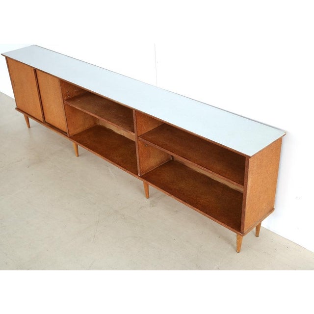 Vintage Sideboard from Nissen Naarden, 1950s, in Good conditions. Designed 1950 to 1959 This piece has an attribution...