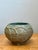 Celebrating organic form and mid-century artisan craft, this vintage stoneware bowl showcases an expressive, sculptural...