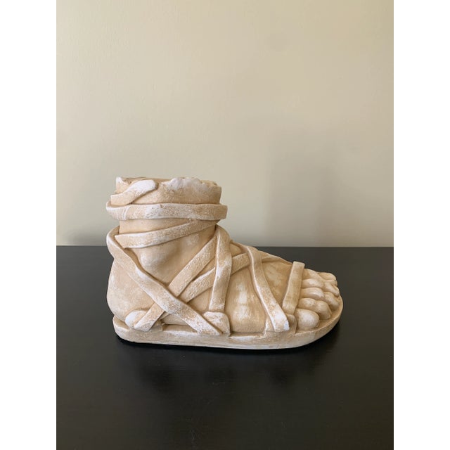A gorgeous Grand Tour style cast plaster sculpture of an Ancient Greek or Roman foot USA, Late 20th Century Measures: 10"W...