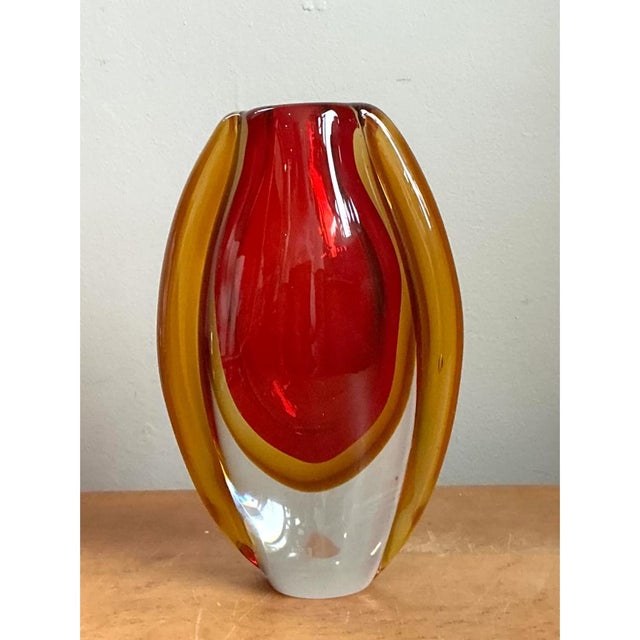 This vintage Murano Sommerso vase exemplifies the celebrated Italian glassblowing technique for which Murano is world...