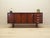 The sideboard was made in the 1970s, Danish production. The structure is covered with rosewood veneer. Legs made of solid...