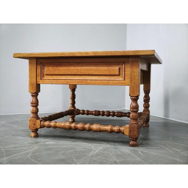 A substantial pair of large solid oak nightstands, likely custom-made in Europe during the 1980s. The pair is particularly...