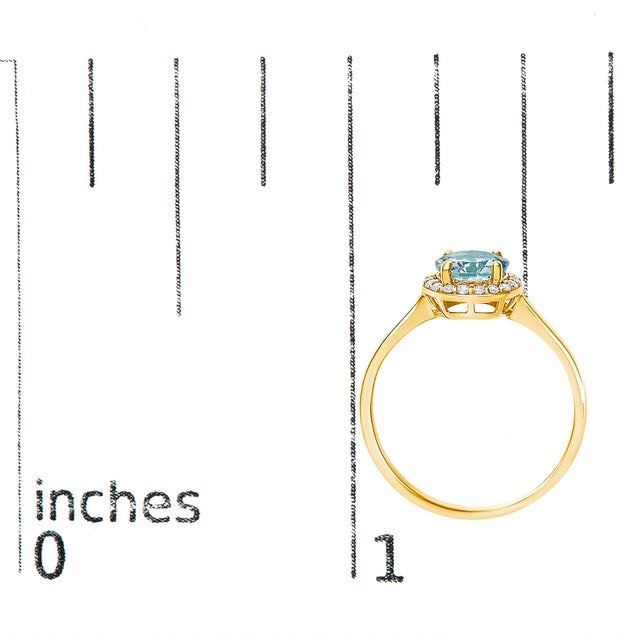 Metal 10K Yellow Gold Blue Aquamarine and 1/10 Cttw Diamond Halo Ring, Size 6.5 For Sale - Image 7 of 7