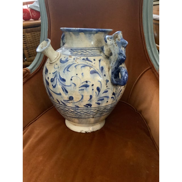 Large Italian Pottery Urn Formed Vase With Seahorse Handles. Blue and White and Floral Painted Glaze. Signed Tuscany Italy...