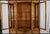 This vintage American of Martinsville faux bamboo and rattan china cabinet is a collector's dream and a rare example of...
