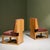 Pair of French Slipper Lounge Chairs from the 1970s. The chairs feature solid oak frames with cubist construction and...