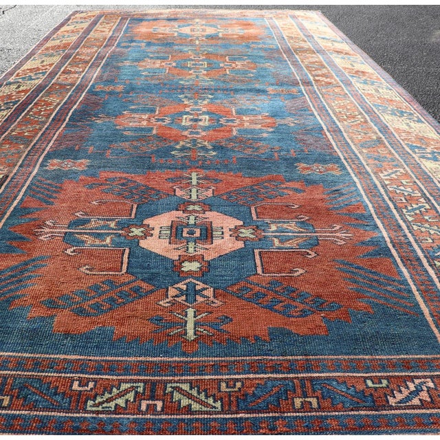 Early 20th Century Antique Persian Kurdish Gallery Rug With Blue Field and Bold Geometric Medallion For Sale - Image 5 of 13
