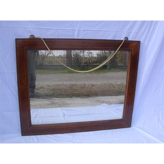 Walnut veneered mirror with maple inlay (fillets). Empire period, circa 1800-1840. The mirror is not contemporary but...