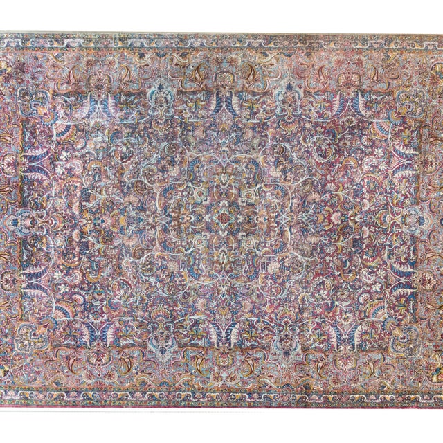 The most mesmerizing early 20th century Persian Kirman rug with an incredible densely woven field of myriad floral...