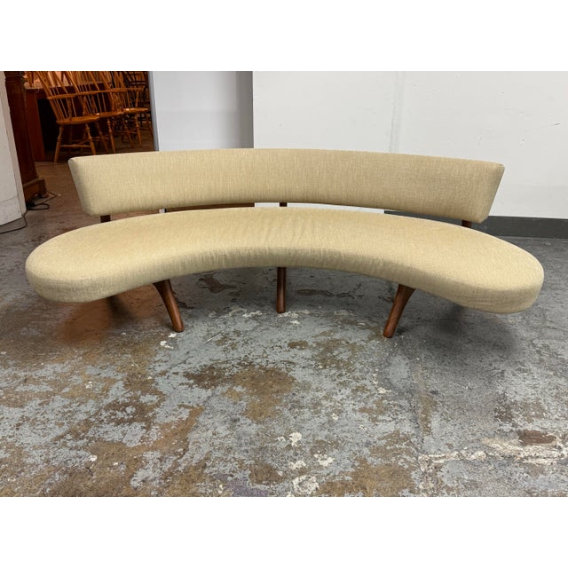 Design Plus Gallery presents a Vladimir Kagan Style Mid-Century Modern Floating Curved Sofa. This sculptural sofa...