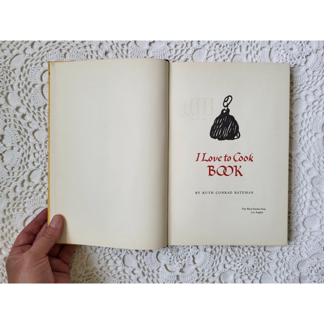 I Love to Cook Book by Ruth Bateman, 1963. It measures 6 ½” x 9 ½” x ¾” and would make a great gift for a graduate,...