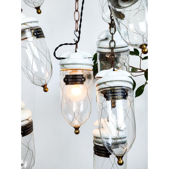 : Beautiful early Dutch clear pendant drop lights. We found these wrapped in newspapers in the original boxes from 1910’s...