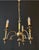 A beautiful antique chandelier. france, 20th century. the chandelier is made of brass. It is decorated with beautiful...