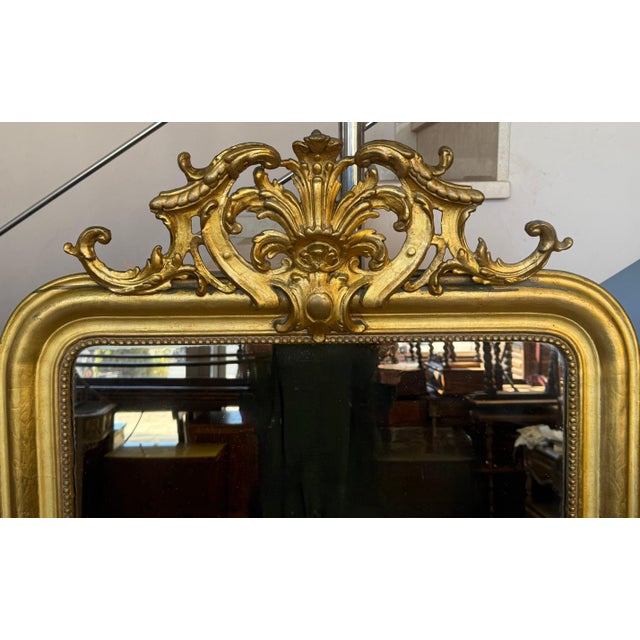 French Provincial French 19th Century Large Vertical Gold Gilt Mirror with Floral crest For Sale - Image 3 of 18