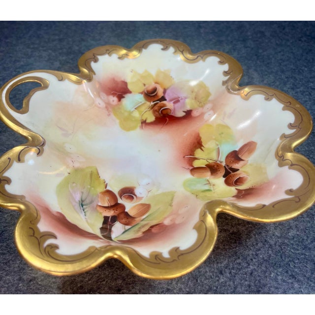 Exquisite Rosenthal & Co. and Pickard China hand-painted scalloped dish showcasing a design of acorns and foliage against...