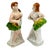 Pair of mid-century dancing hula couple by Okada China, made in Japan. This set Features a female hula dancer alongside a...