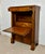 Elegant French Empire secretaire abattant crafted in walnut, featuring striking book-matched veneer, ebonized column...
