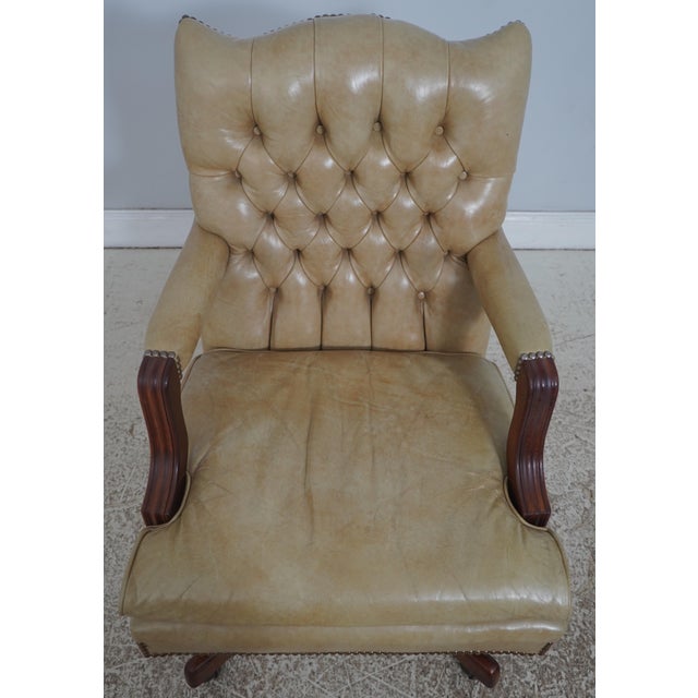 Age: Approx. 30 Years Old Details: Mahogany Brass Capped Casters Tufted Back High Quality Construction Nice Tooled Leather...
