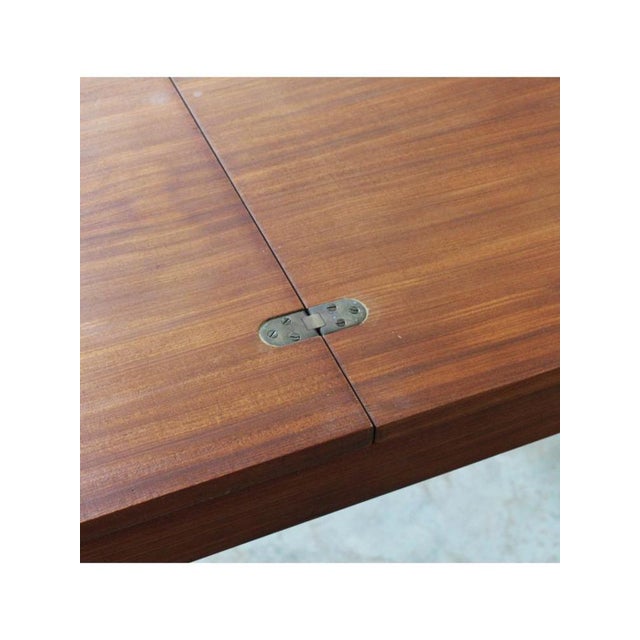 Type: Square folding table Date: 1950s–1960s Origin: Italy Materials: Wood, Metal Model: Square folding table Condition:...