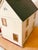 Charming early 20th-century American center-hall colonial dollhouse constructed of plywood and retaining an appealing old...