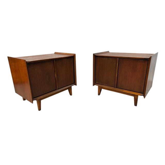 Presenting this exceptional pair of Mid-Century Modern Lane 1st Edition Walnut Nightstands, circa 1960s, beautifully...