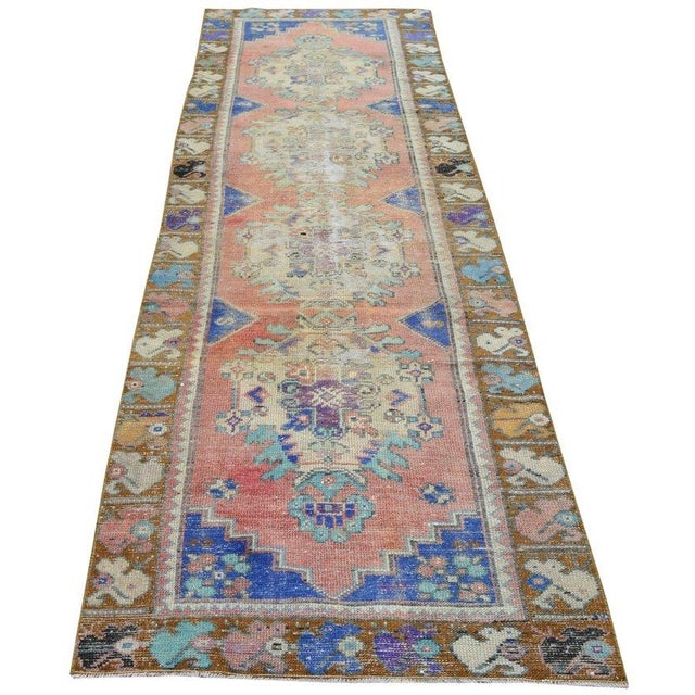 Hand-knotted with care using traditional rug-making techniques, this wool rug blends timeless craftsmanship with a modern...