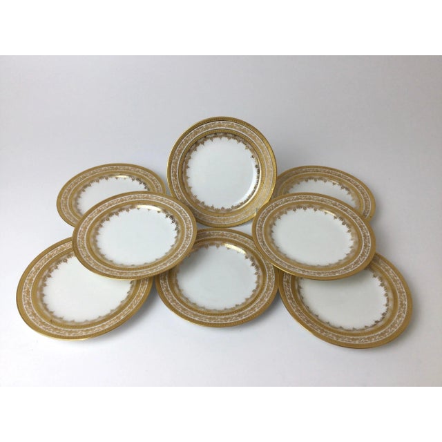 Set of 8 Limoges gold encrusted bread and butter plates 6.25". Wonderful age appropriate condition with very very minor wear.