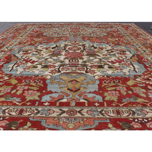 Measures: 9'7 x 11'6 Square Antique Persian Bakhtiari Rug with Red Field and Ivory Medallion. Keivan Woven Arts/...