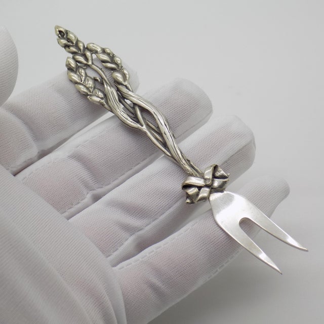 Elegant vintage Italian handmade genuine silver cocktail fork, finely decorated with a classic wheat ears motif. A refined...