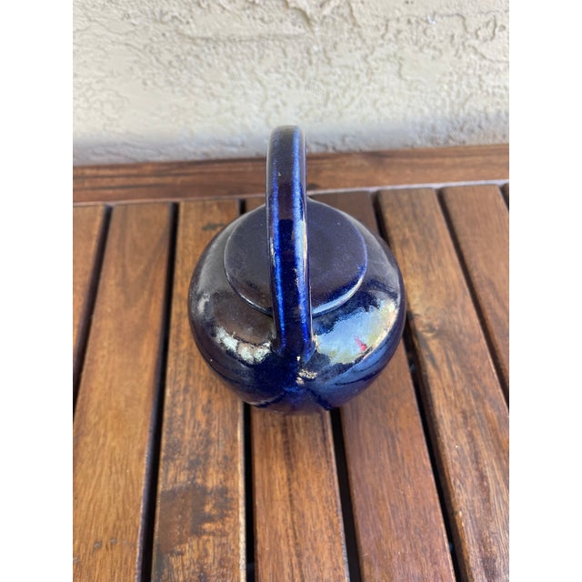 Similar teapots are commonly associated with Japanese production, specifically from regions like Tokoname, which is one of...