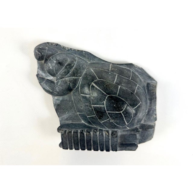 Sculpture signed on the bottom with the inscription "BY SARAH" on paper. The artist was illiterate. This piece has an...