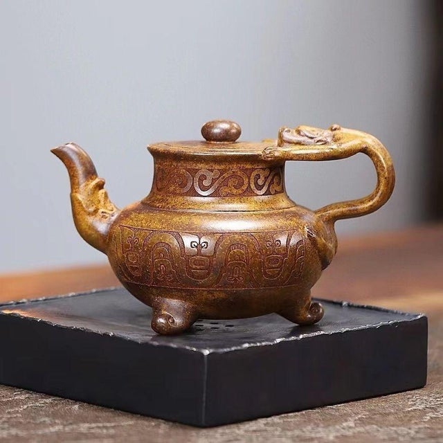 Art Deco Hand-Carved Auspicious Motif Yixing Zisha Wine & Tea Pot – Wood-Fired Golden Vessel (Jin Zun) Handmade Clay Teapot For Sale - Image 3 of 9