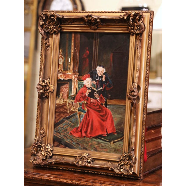 An intimate moment between two clergymen unfolds in this finely detailed antique genre painting titled L’Évêque à la...