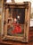 An intimate moment between two clergymen unfolds in this finely detailed antique genre painting titled L’Évêque à la...