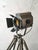 A belgian studio spotlight by adb, ets a. Backer s.a., produced in the 1960s and mounted on a german army field tripod by...