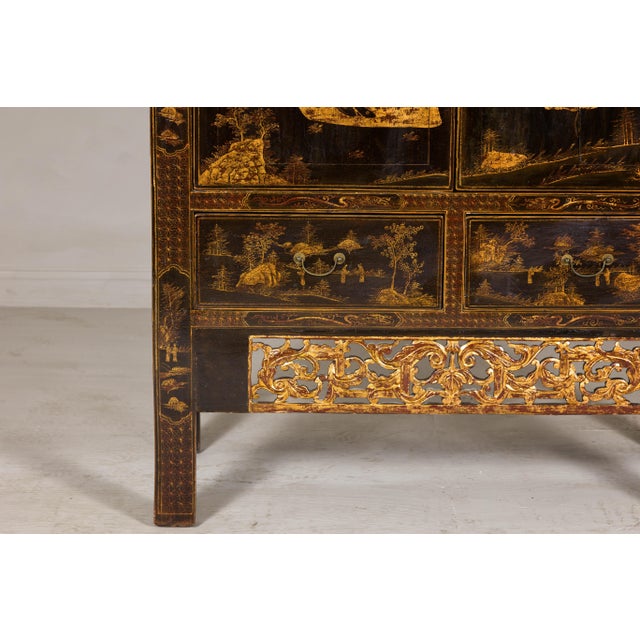 A late Qing Dynasty Chinese cabinet crafted from solid elm wood, this piece showcases exquisite artistry and timeless...