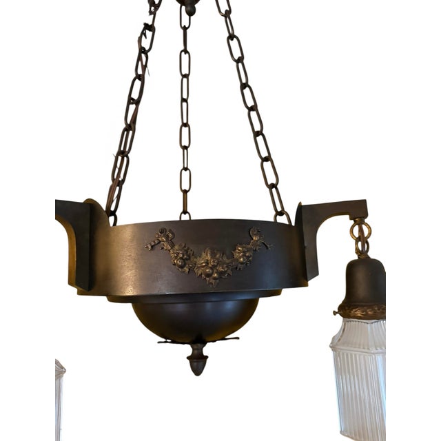 American Circa 1920’s Dark Brozed Patina Chandelier With Ribbed Glass Shades For Sale - Image 3 of 5
