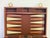 Handsome classic Backgammon game in tan, brown, and black case for playing at home or on the road..Features complete...