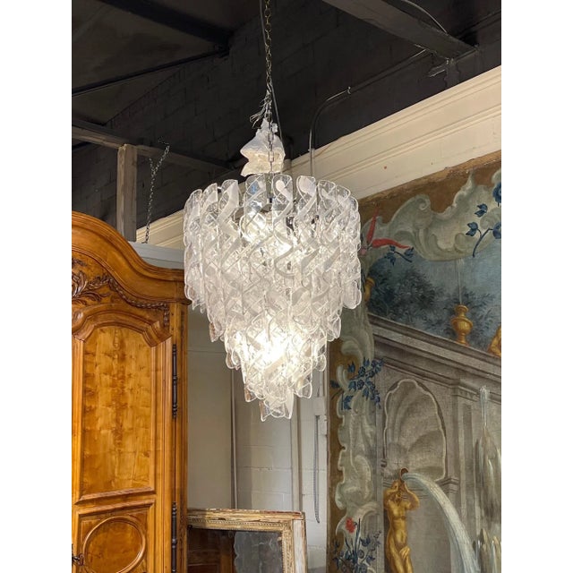 Beautiful decorative modern Murano spiral shaped glass in clear and white. The scale and shape of these sparkling beauties...