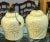 Set of 2 Large mid century ceramic lamps. Color light yellow.