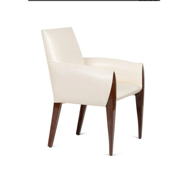 A stylish armchair from Dakota Jackson's Ke-Zu collection. Upholstered in full-grain white leather over a form-fitted...