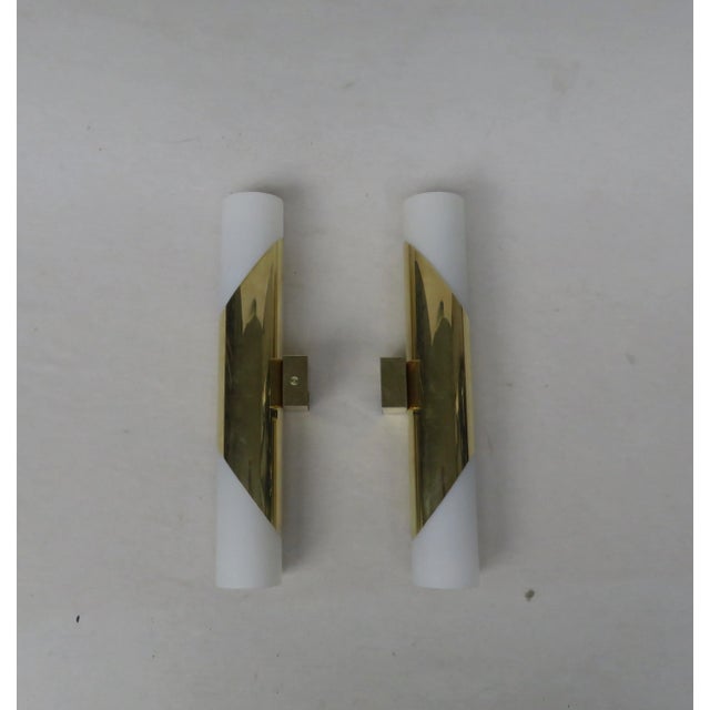 Noble pair of wall lights from the 60s, Neuhaus lights, polished brass, brass and 4 cylindrical lampshades frosted casing...
